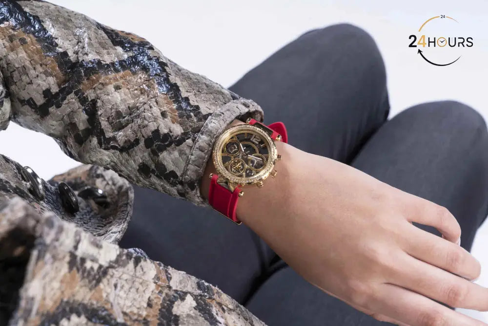 Montre multifonctions Guess Solstice à cadran rond doré pour femme