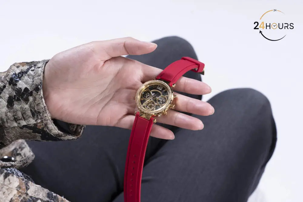 Montre multifonctions Guess Solstice à cadran rond doré pour femme